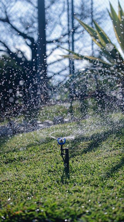 Smart irrigation system controlling garden watering automatically in a home landscape
